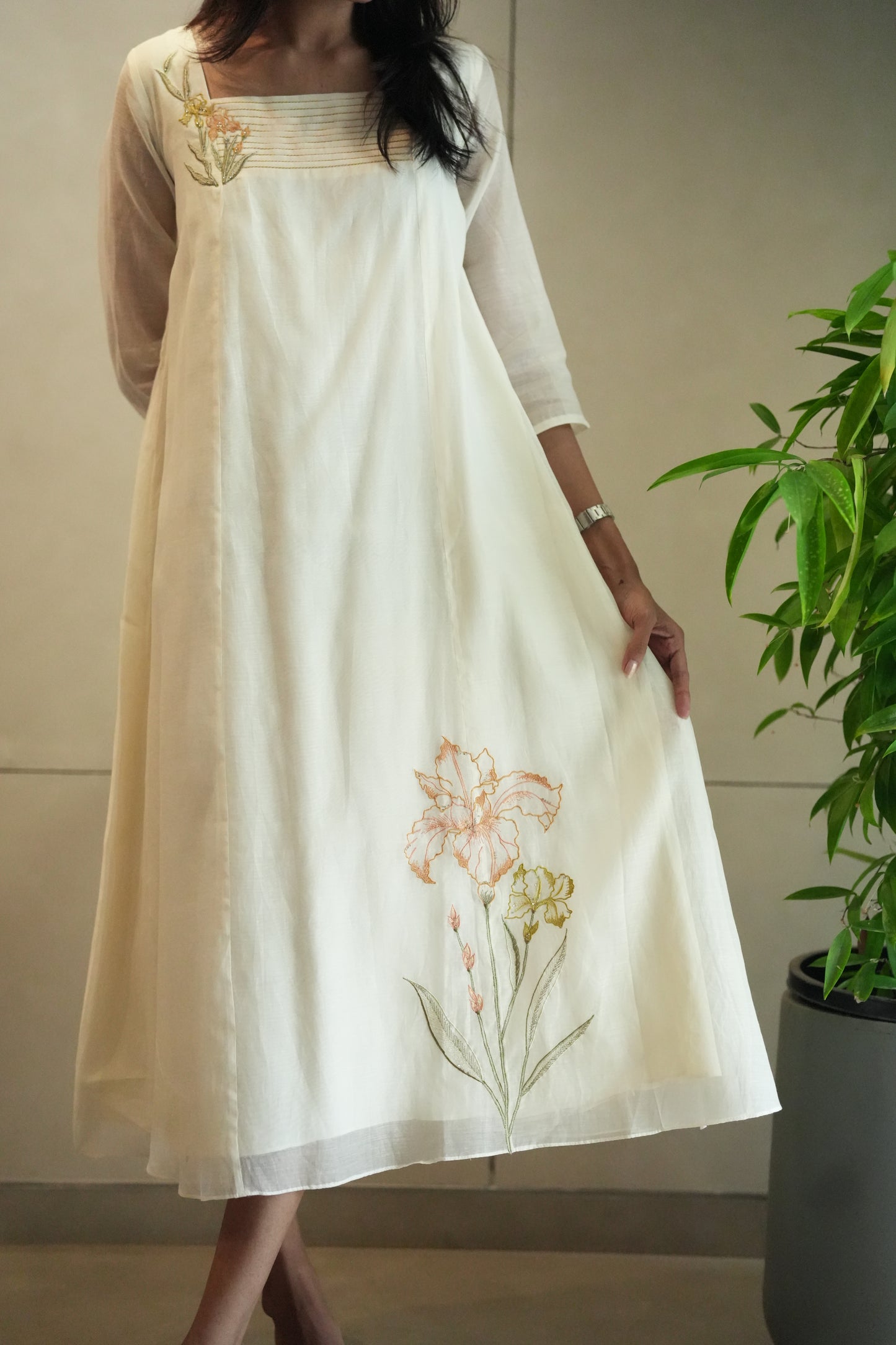 Off white Chanderi frock with pleated yoke and floral embroidery