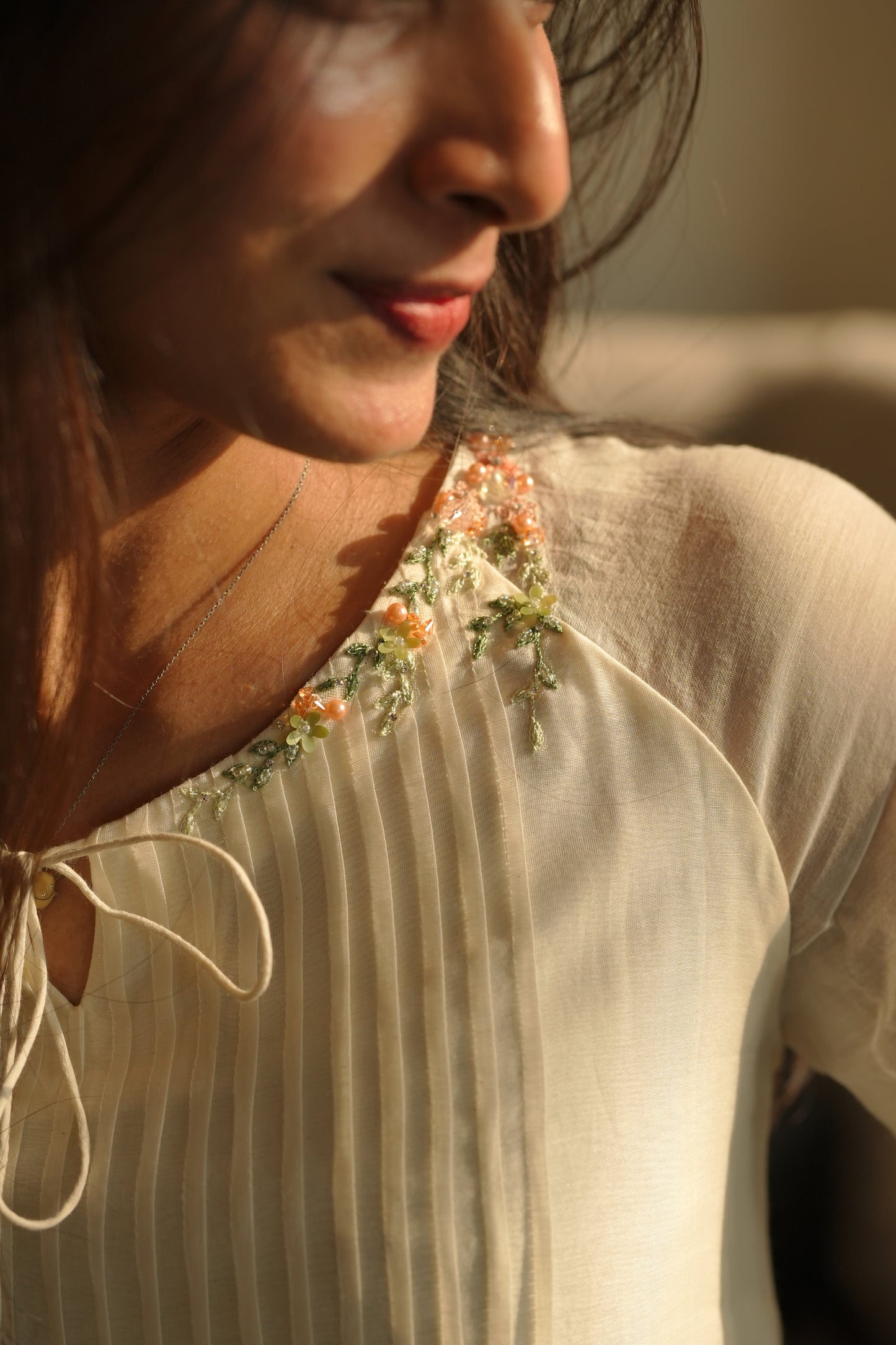 Off white chanderi frock with pink tuck and gathered floral sleeves