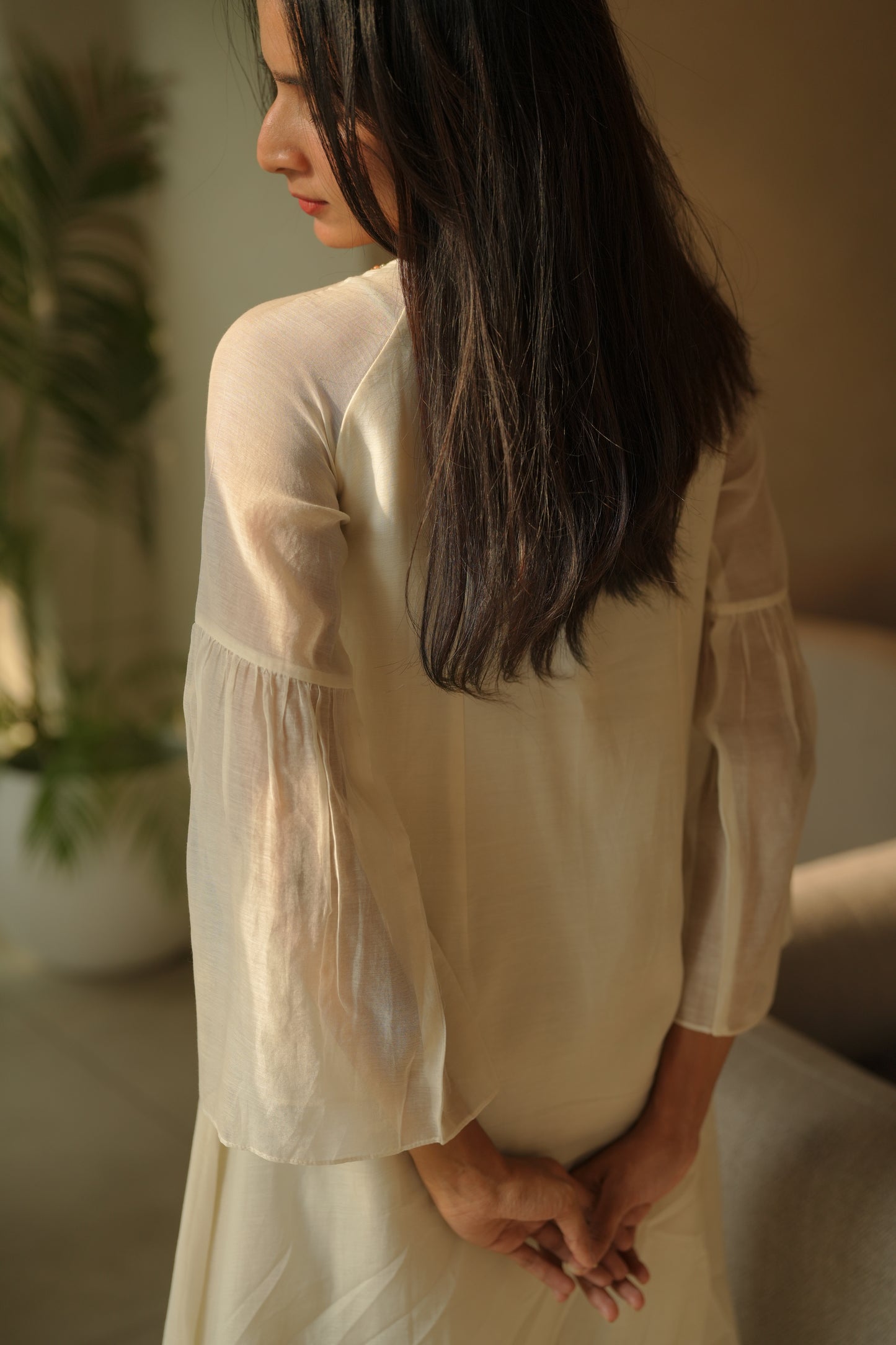 Off white chanderi frock with pink tuck and gathered floral sleeves