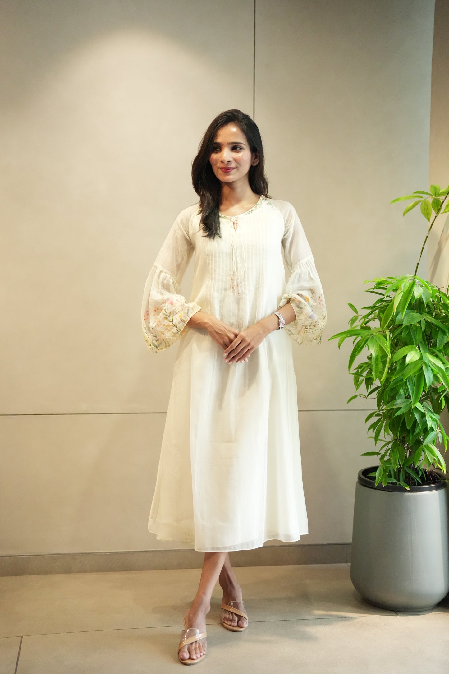 Off white chanderi frock with pink tuck and gathered floral sleeves