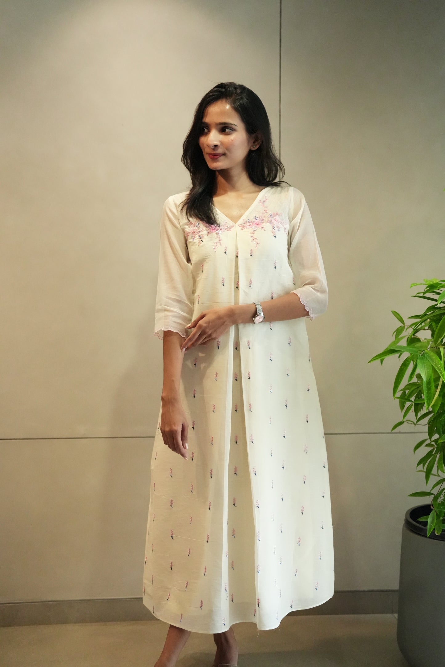 Off white frock with floral embroidery