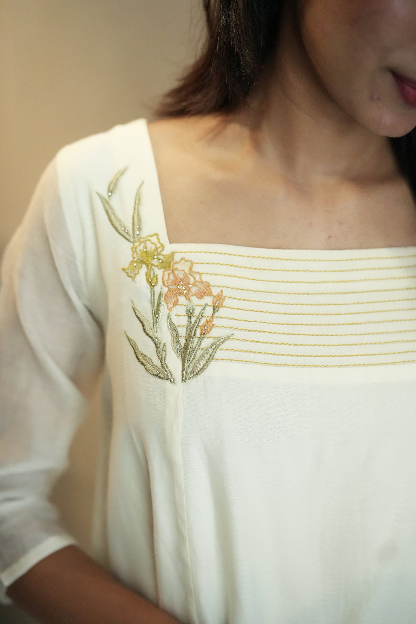 Off white Chanderi frock with pleated yoke and floral embroidery