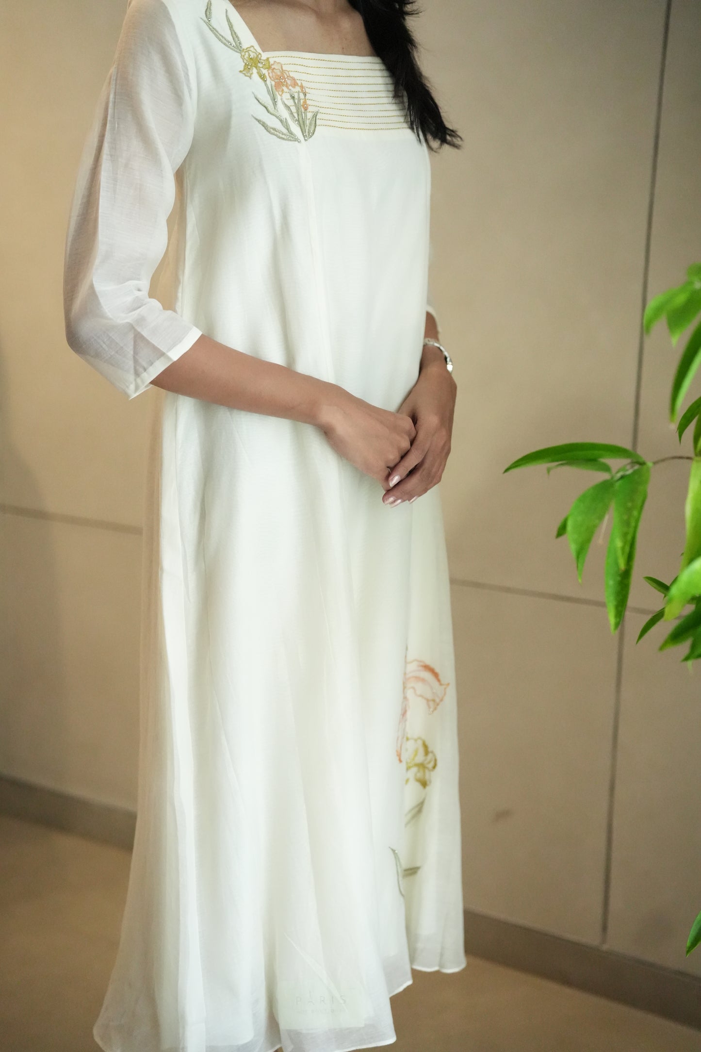 Off white Chanderi frock with pleated yoke and floral embroidery